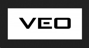 VEO:n logo, jossa on sininen ympyrä ja valkoinen teksti
