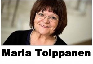 Maria Tolppanen esittelee kirjallisia kysymyksiään eduskunnassa
