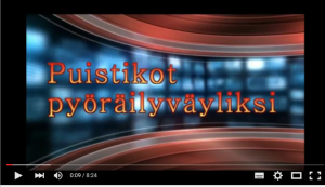 Puistikko, jossa pyöräilijät nauttivat luonnosta