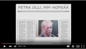 Petra Olli painimassa MM-hopeamitalin voittaneessa ottelussa