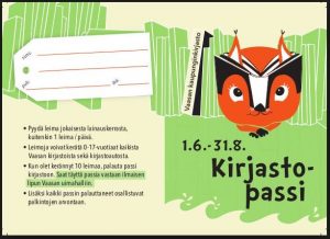 Kirjastokortti ja uimahallin ranneke pöydällä