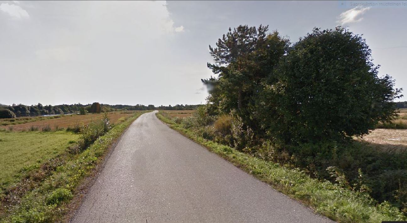 Lakeusmaisema, jossa kaksi ihmistä kävelee kohti horisonttia