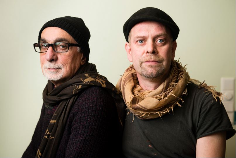 Maahanmuuttajat istuttavat kasveja Kuntsin työpajassa